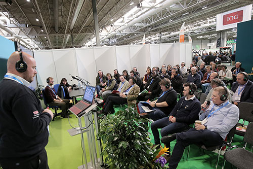 Man talking to crowd at SALTEX event 