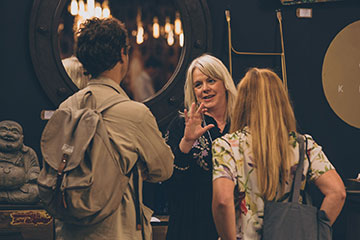 Woman talking to a customer at an event