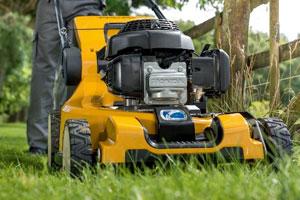 A man mowing his lawn